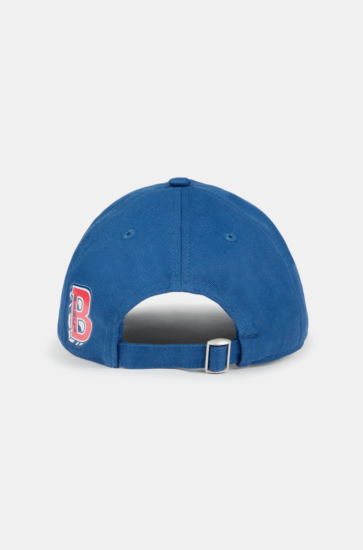 Blue FC Barcelona cap with "BLAUGRANA 1899" embroidered in white and red on the front, featuring a curved brim and a small Barça crest on the side.
