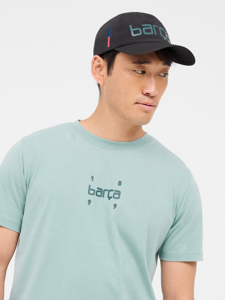 Black baseball cap with the word 'Barça' in metallic-style lettering on the front.