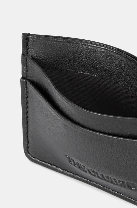 Black leather cardholder with embossed “THE CLUB” text on the front, featuring two horizontal card slots.