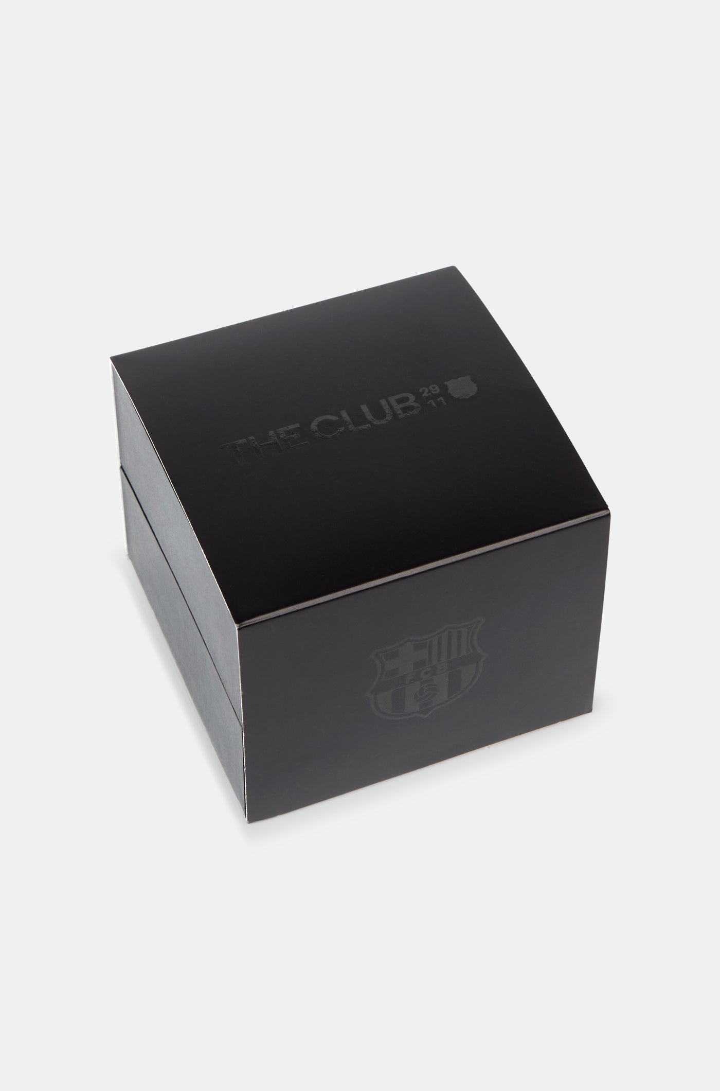 Black wristwatch with FC Barcelona crest, displayed in a black presentation box, featuring a dark dial with red and blue accents and a yellow second hand