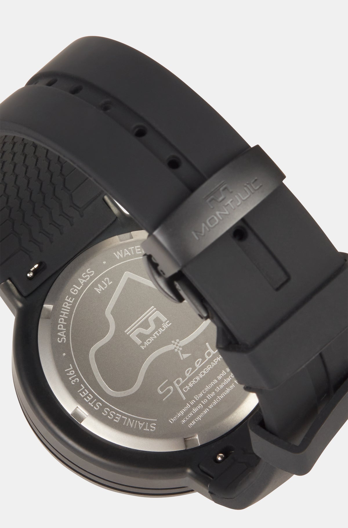 Black wristwatch with FC Barcelona crest, presented in a black box. The watch face is predominantly blue with red and blue details on the dial, white markings, and a yellow second hand.