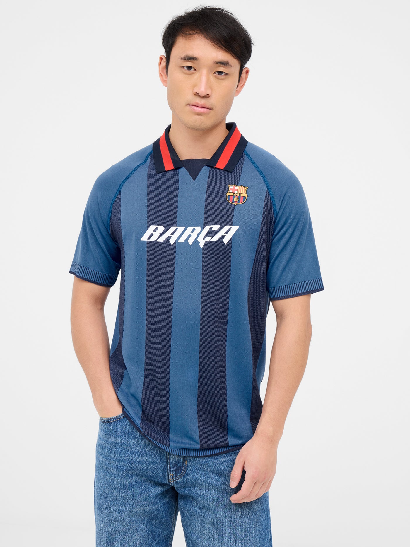 Blue striped polo with shield