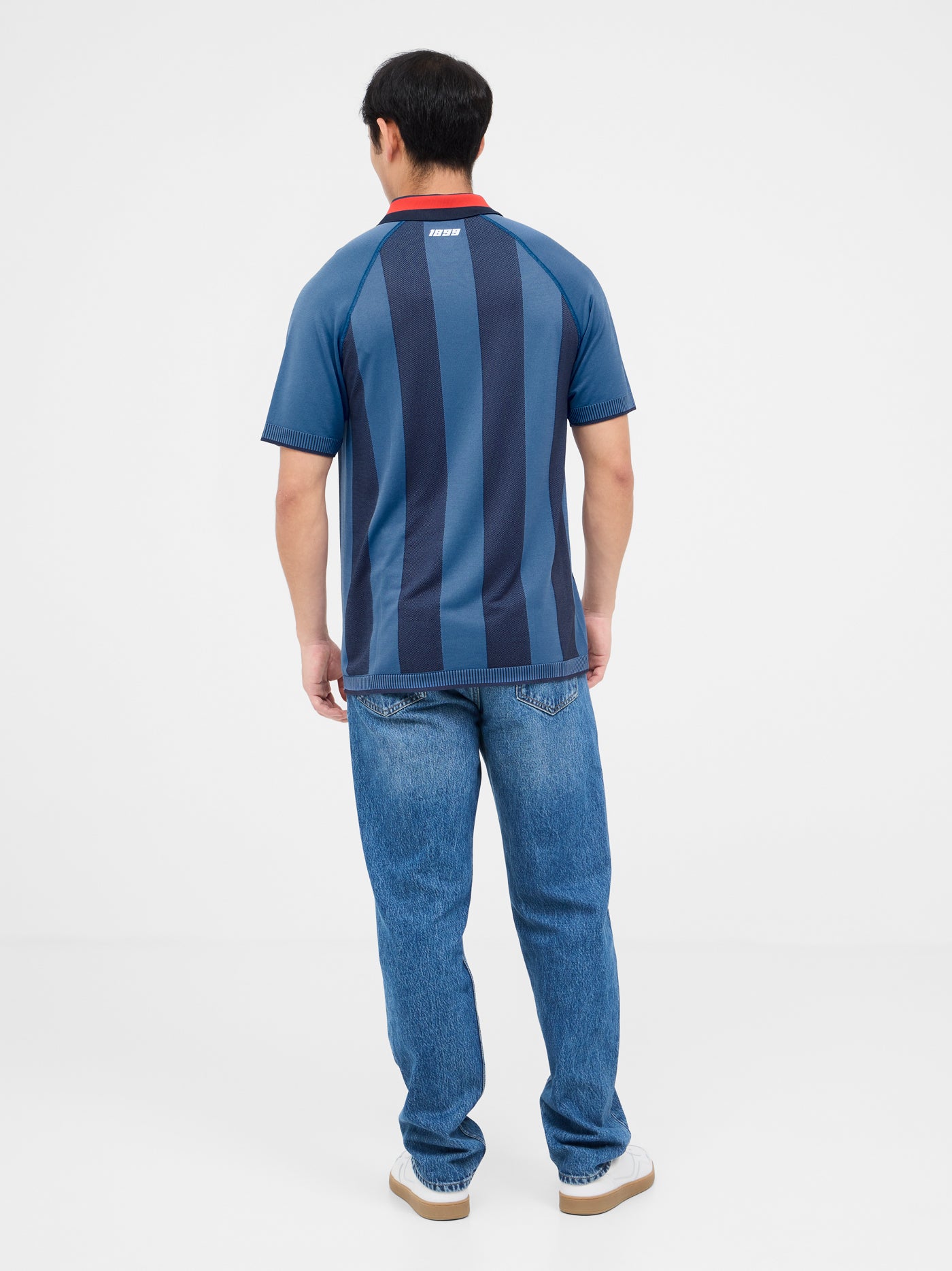 Blue striped polo with shield