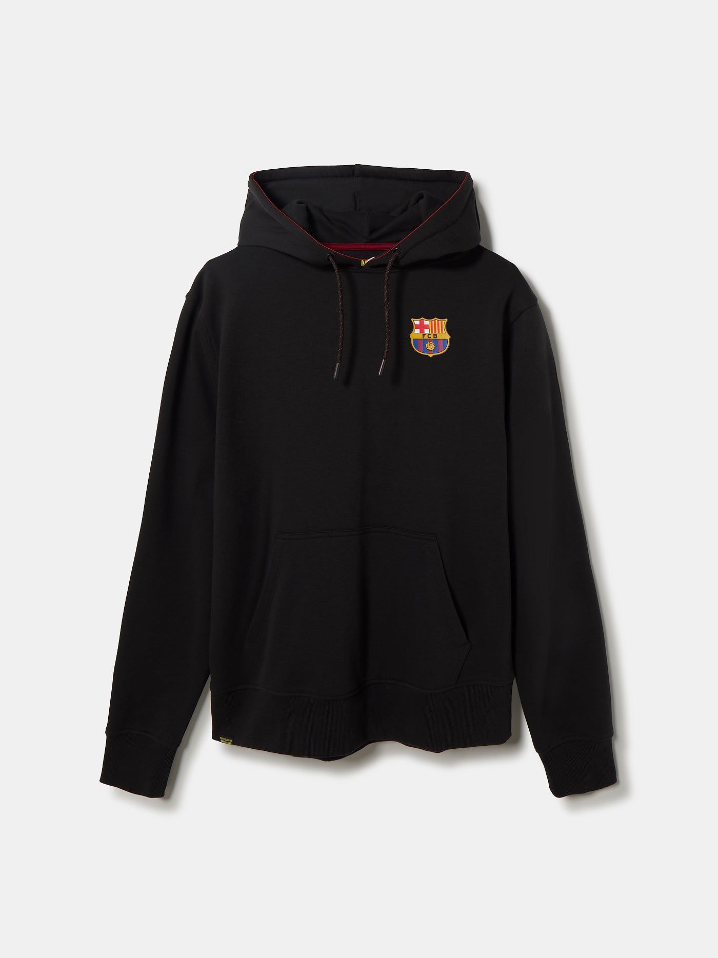 Person wearing a black hoodie featuring a mosaic-style artwork on the back in the shape of the FC Barcelona crest, filled with vibrant patterns and colors reminiscent of Antoni Gaudí's style.