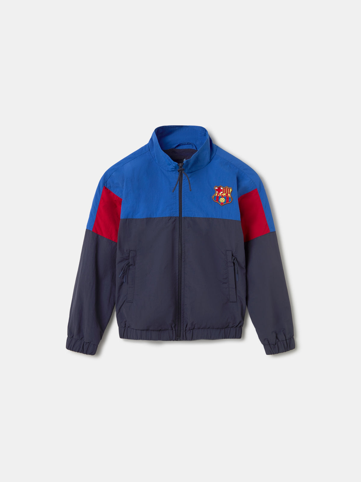 Color-block windbreaker jacket in blue, red, and navy with FC Barcelona crest on the chest
