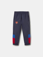 Navy jogger pants with FC Barcelona crest on the upper leg and red and blue color blocks on the knees.