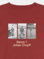  red T-shirt featuring three vintage photos of Johan Cruyff with a football, and the text 'Barça X Johan Cruyff' printed on the back