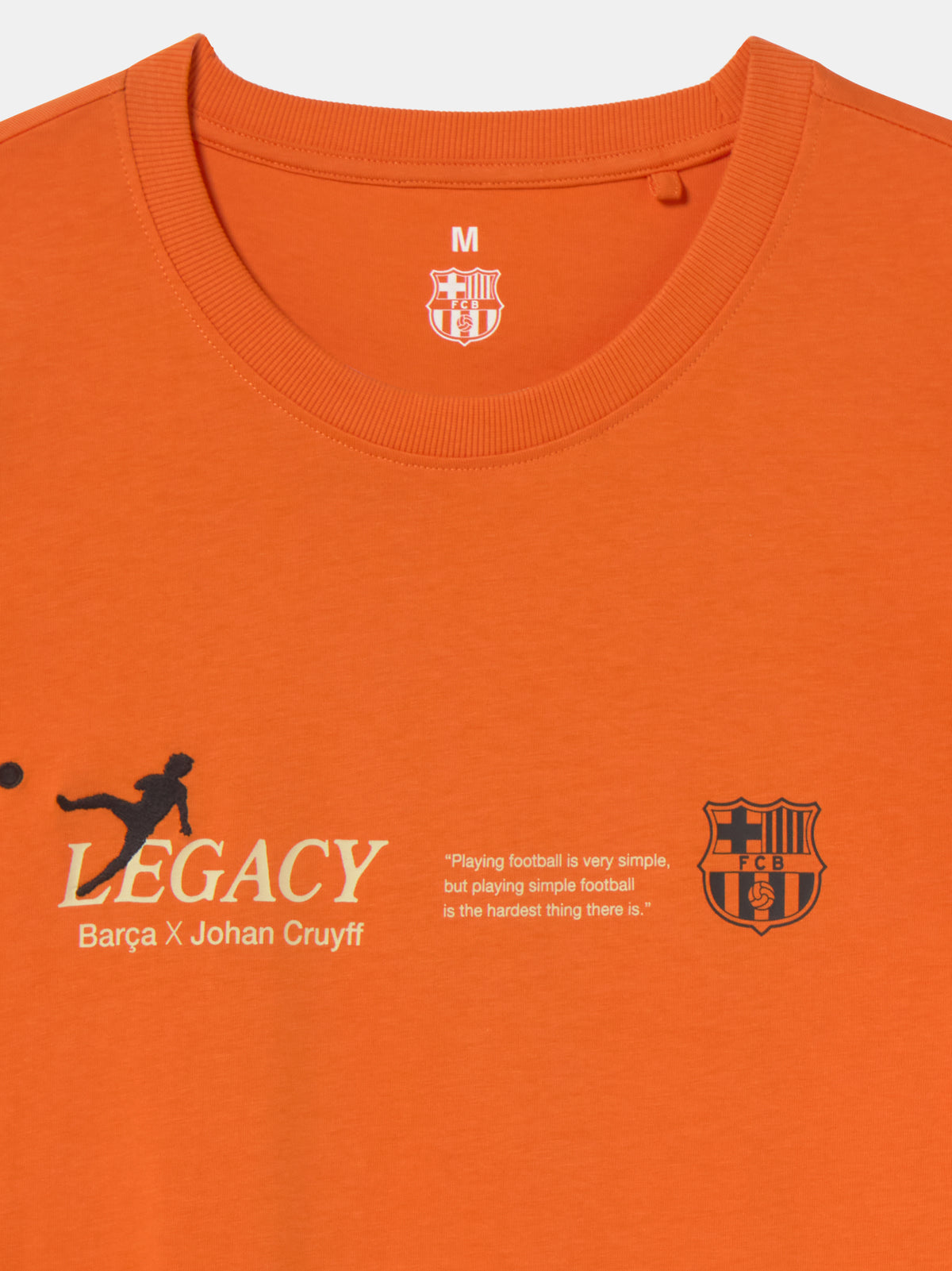 Bright orange T-shirt featuring a black-and-white image of Johan Cruyff during a match and his name below the photo