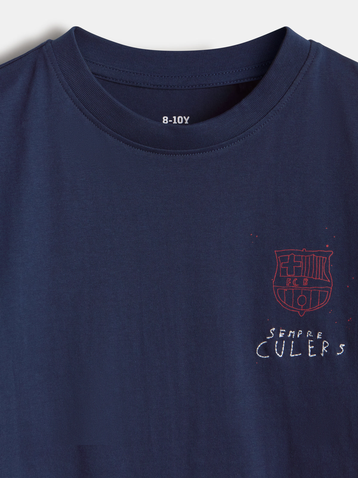 Front view of a navy FC Barcelona shirt with a small red crest and “Sempre Culers” text on the chest.