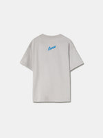 light grey FC Barcelona t-shirt featuring an oversized colorful club crest on the front.