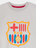 light grey FC Barcelona t-shirt featuring an oversized colorful club crest on the front.