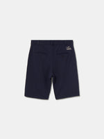 Navy blue FC Barcelona shorts with side pockets and the club crest embroidered near the hem on the left leg