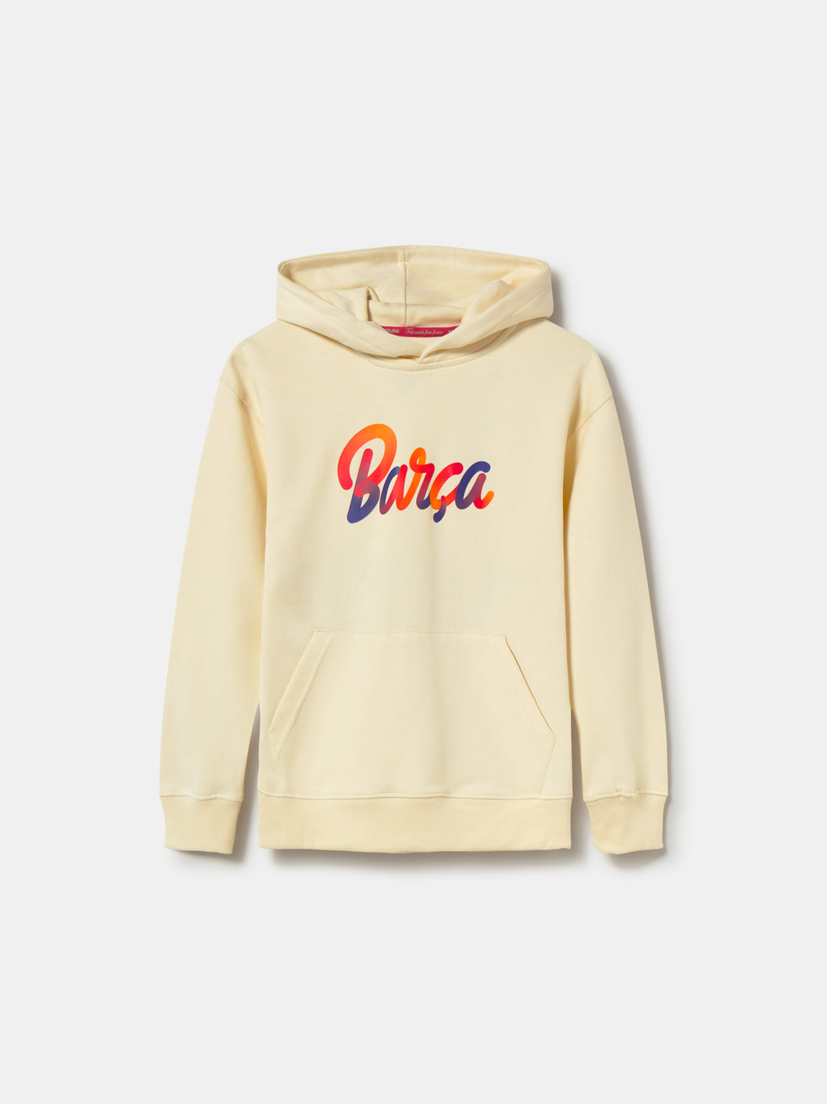 Beige FC Barcelona hoodie for kids, featuring a colorful 'Barça' text on the front and 'Futbol Club Barcelona - Tots units fem força' with the club crest on the back