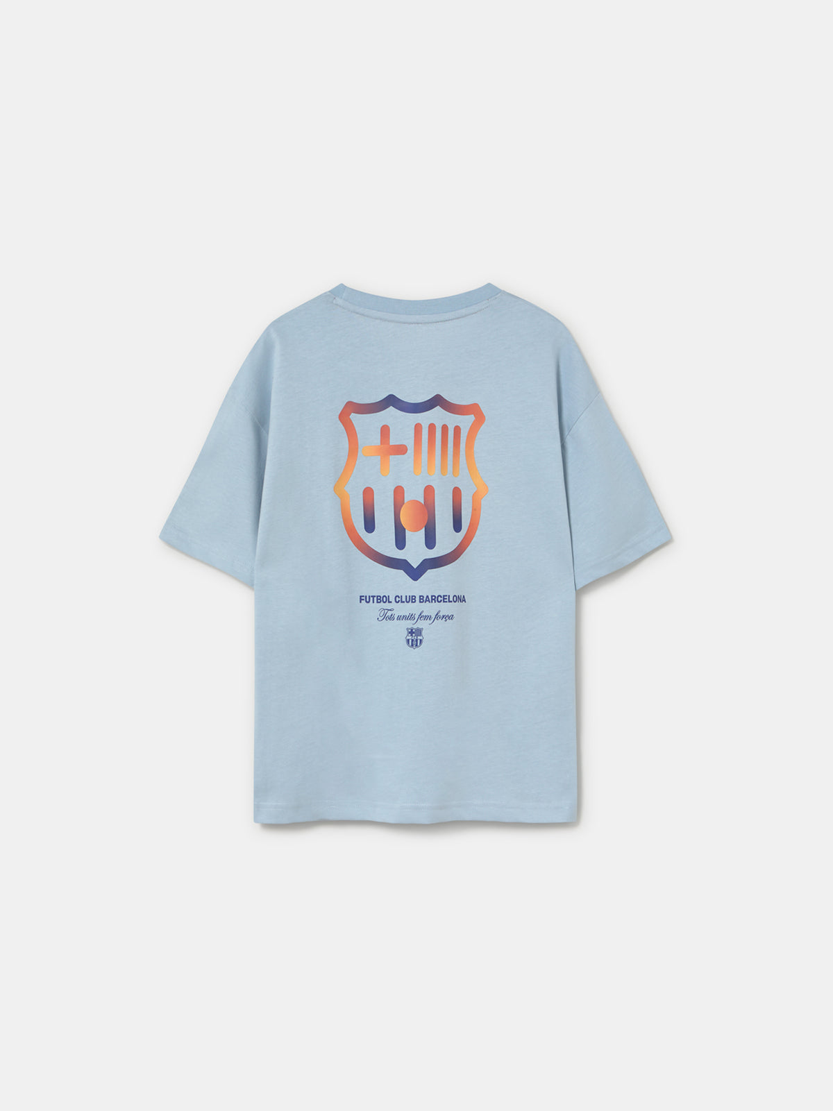 light grey FC Barcelona t-shirt with a large gradient club crest printed on the back, along with the text "Futbol Club Barcelona" and the motto "Tots units fem força