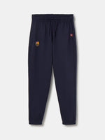 Navy blue FC Barcelona joggers featuring the club crest on the left leg and an elastic waistband with drawstrings