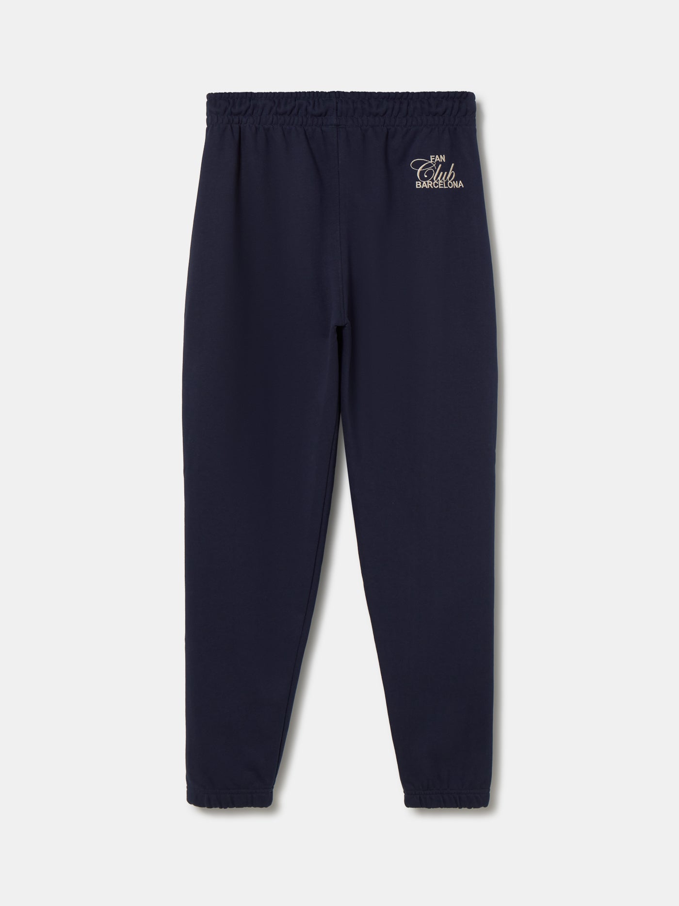 Navy blue FC Barcelona joggers featuring the club crest on the left leg and an elastic waistband with drawstrings