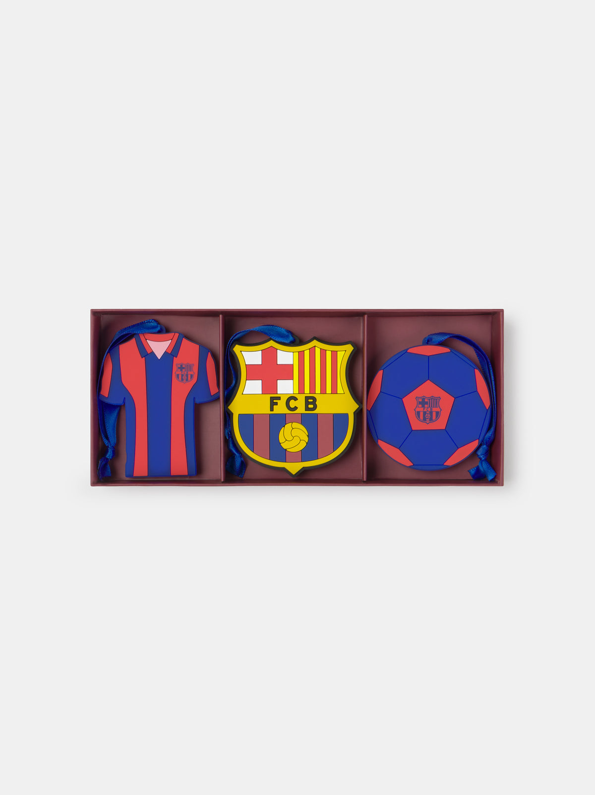 Set of three FC Barcelona-themed ornaments in a maroon box: a striped jersey, the club crest, and a blue-and-red football.
