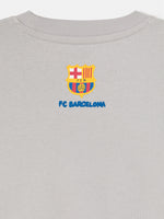  light grey FC Barcelona sweatshirt with a cartoon footballer and the word 'Barça' in blue