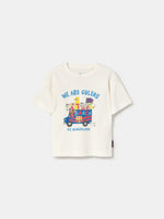 white FC Barcelona T-shirt with colorful cartoon illustrations and the text 'We Are Culers