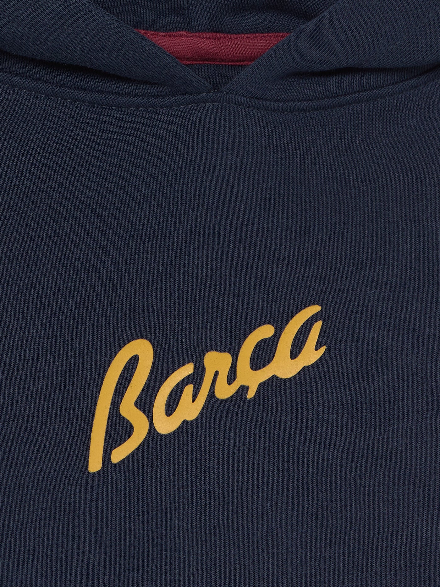 Navy hoodie with FC Barcelona crest and 'Més que un club' slogan printed on the back.