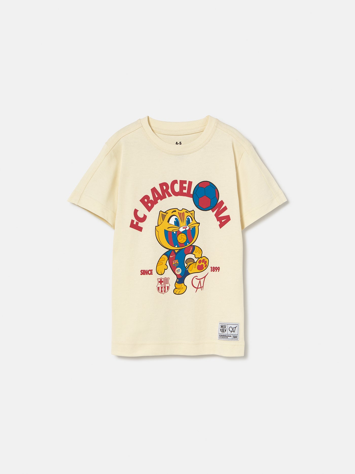 cream FC Barcelona T-shirt featuring the club's name and Cat Culer, the cartoon mascot, playing football.