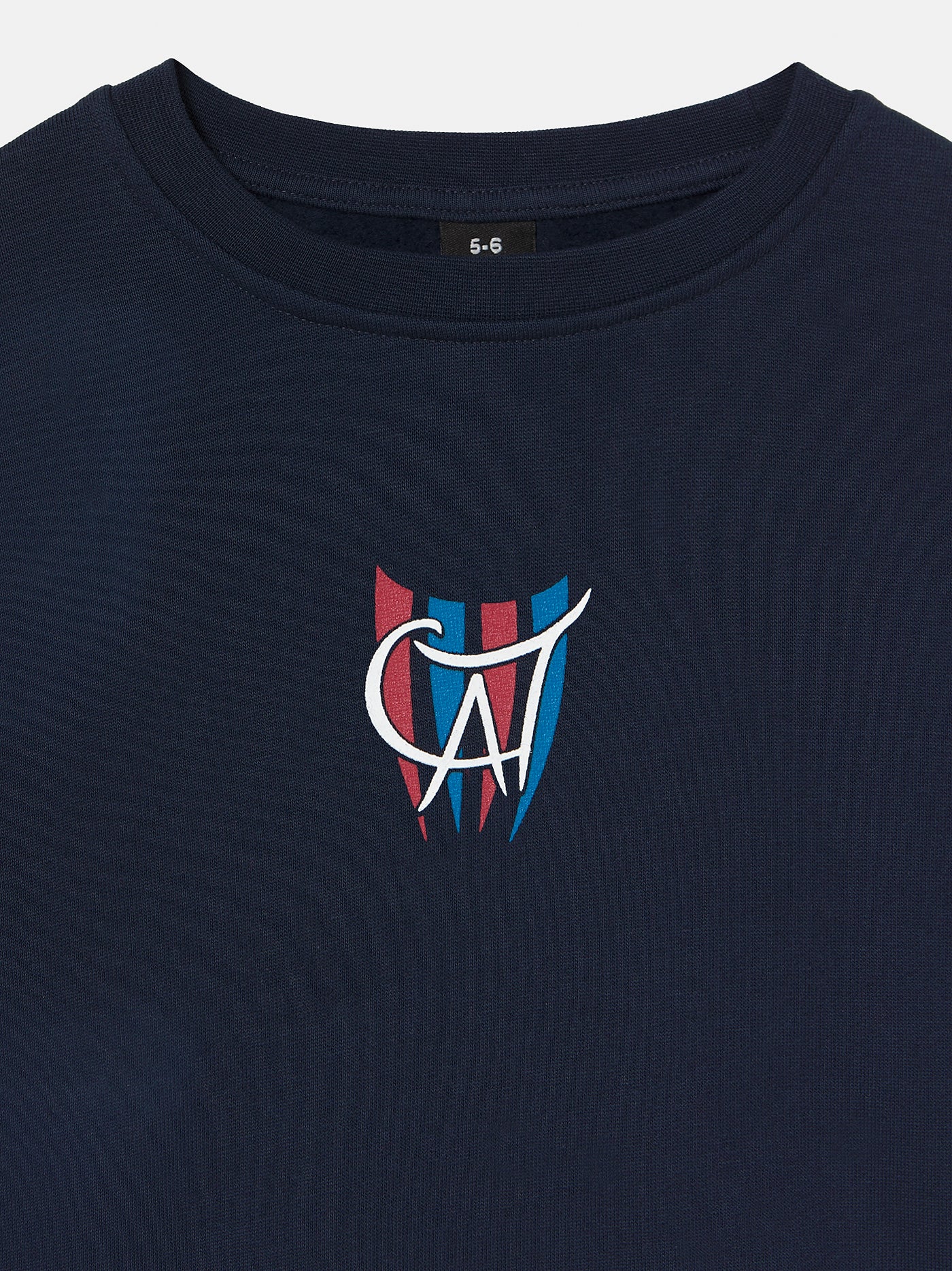 Navy blue kids’ sweatshirt featuring a large back graphic of Cat Culer, the FC Barcelona mascot, with the text 'FC BARCELONA' and 'Since 1899' in bold red and yellow.