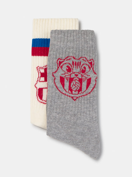 FC Barcelona socks with red and blue stripes and the club crest