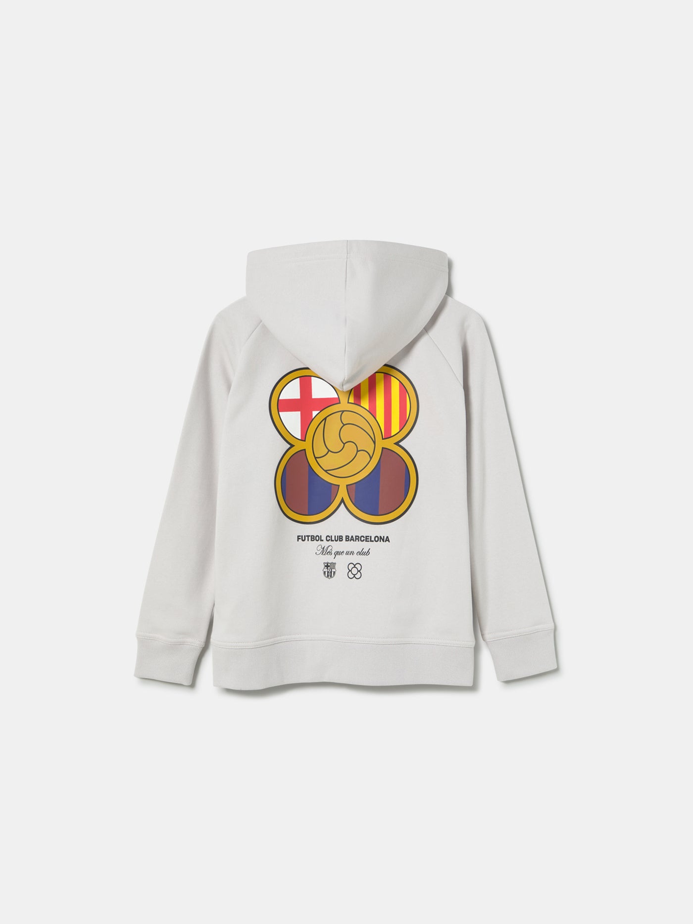White FC Barcelona hoodie featuring a unique back design with a four-petal flower made of circular emblems: the St. George cross, Catalan flag, blaugrana stripes, and a central golden football. Below the graphic, the text reads “Futbol Club Barcelona” and “Més que un club” along with minimalist logos.