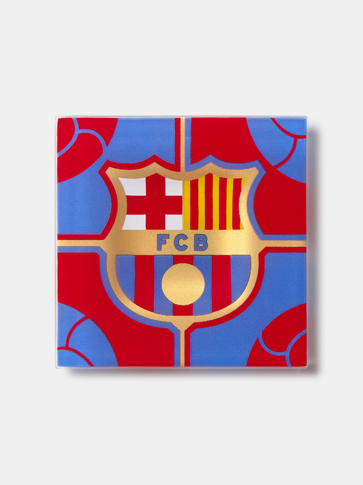 Magnet with FCB logo on a blue and red patterned background