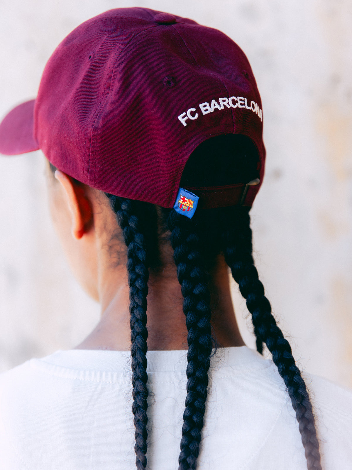 Burgundy cap with the phrase 'We are Culers' embroidered in white on the front. Classic adjustable design inspired by FC Barcelona's colors.