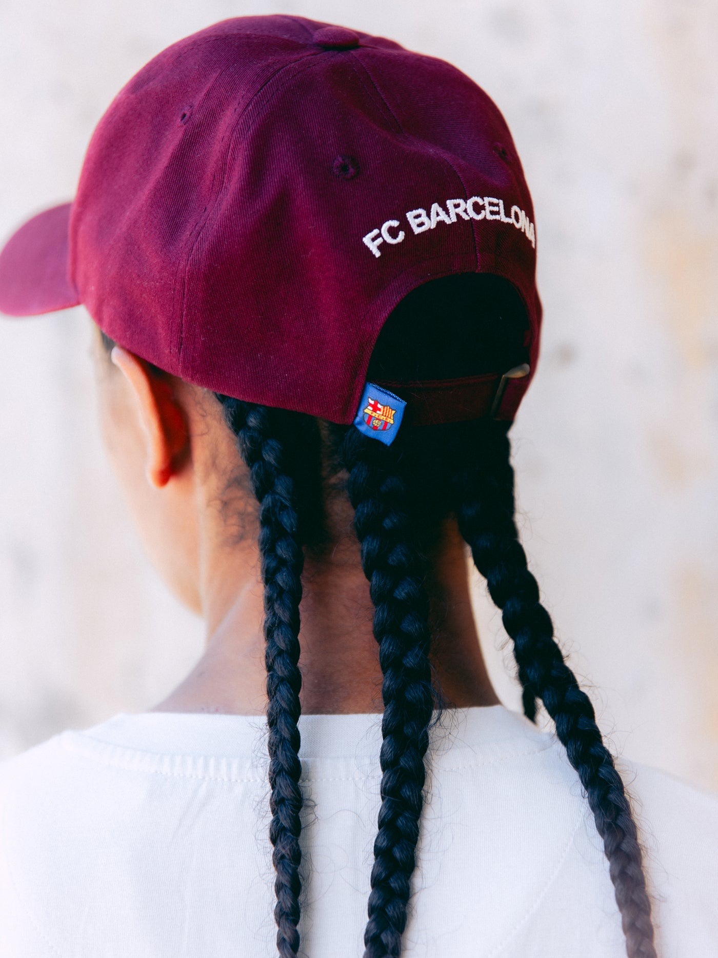 Burgundy cap with the phrase 'We are Culers' embroidered in white on the front. Classic adjustable design inspired by FC Barcelona's colors.