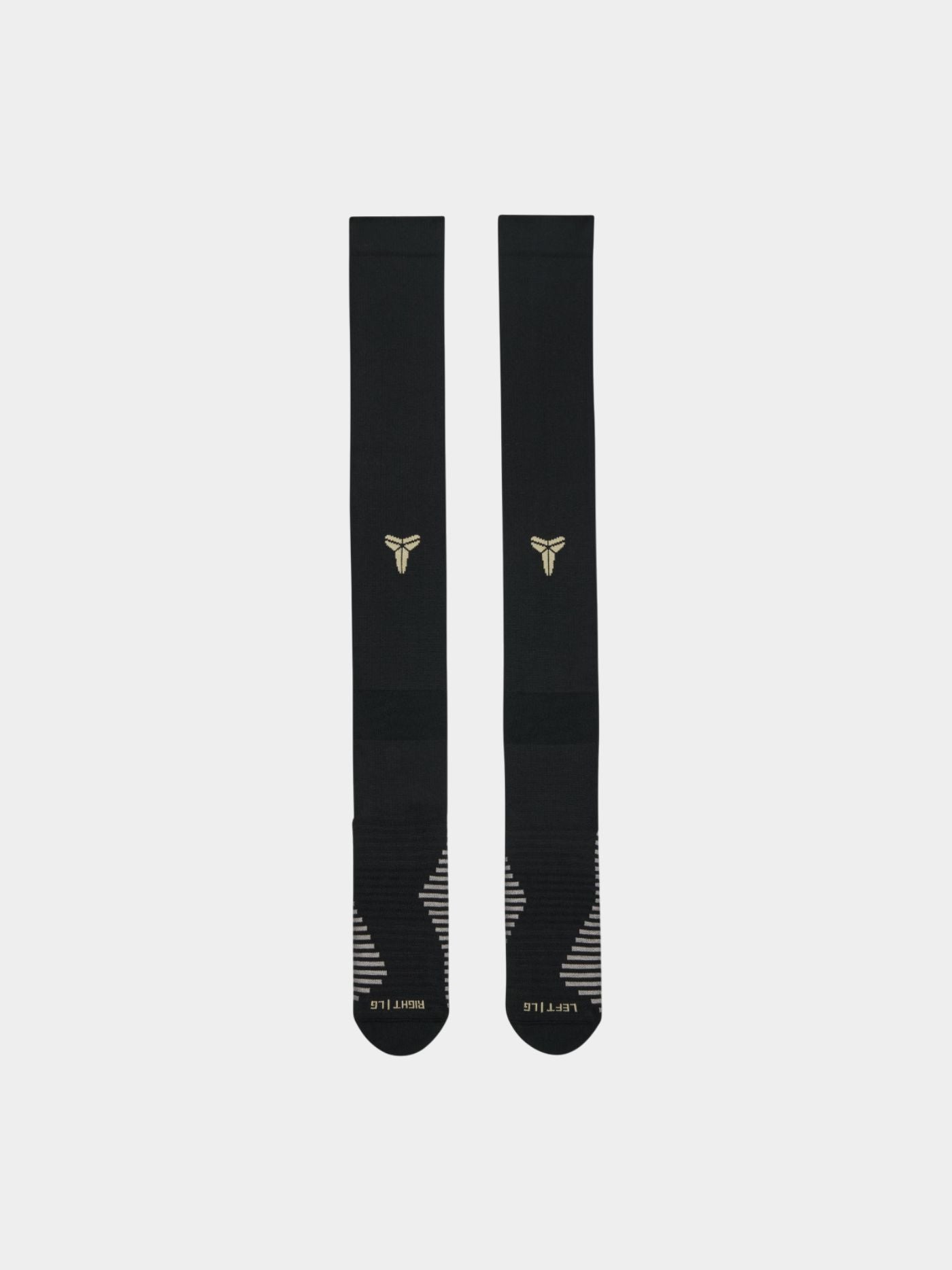 Pair of black FC Barcelona football socks featuring the Kobe Bryant tribute logo in white and reinforced grey-striped soles for grip and comfort