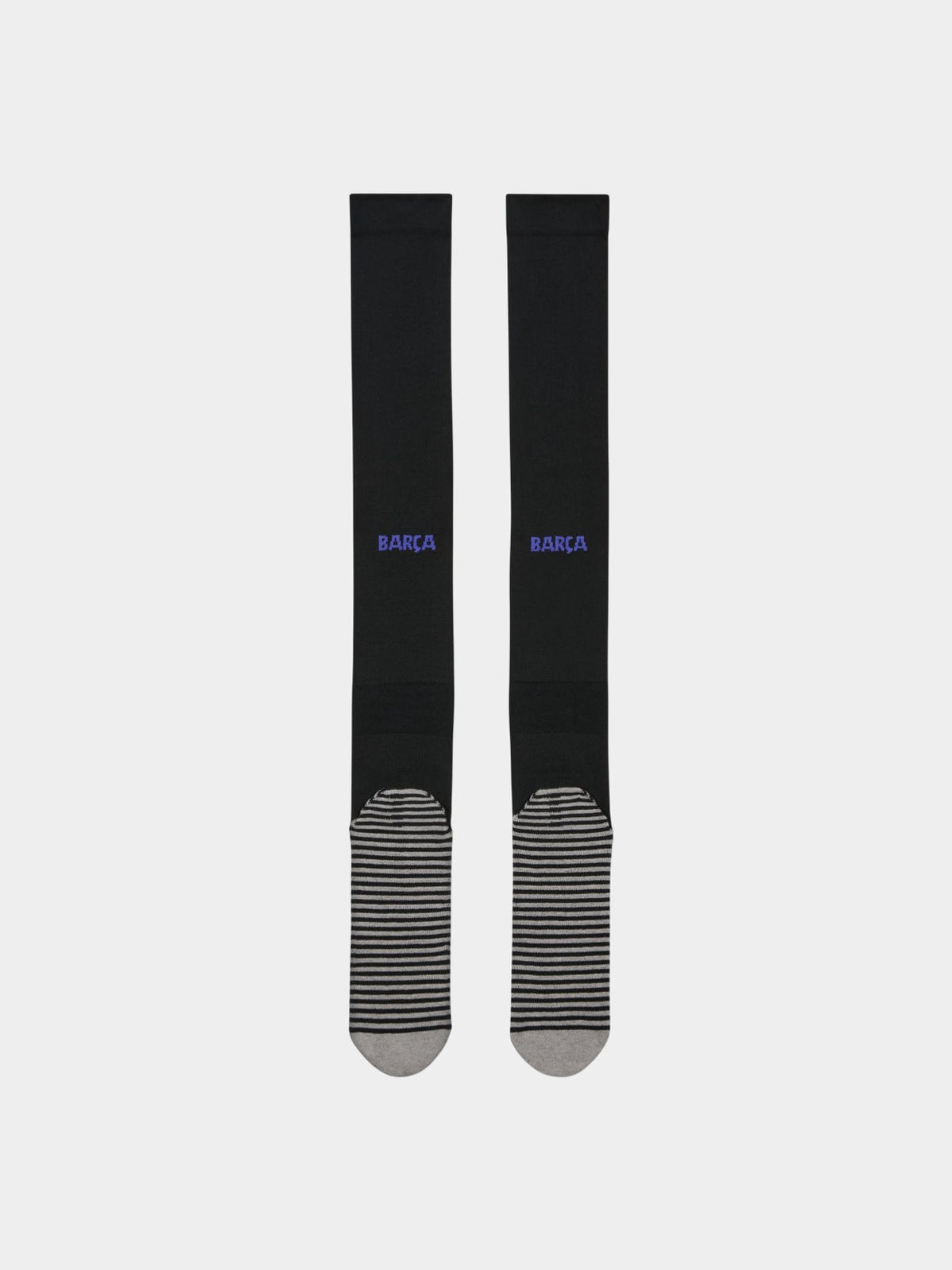 Pair of black FC Barcelona football socks featuring the Kobe Bryant tribute logo in white and reinforced grey-striped soles for grip and comfort
