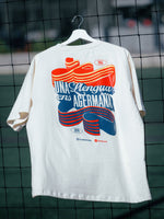 White t-shirt with colorful graphic design on a hanger against a grid background