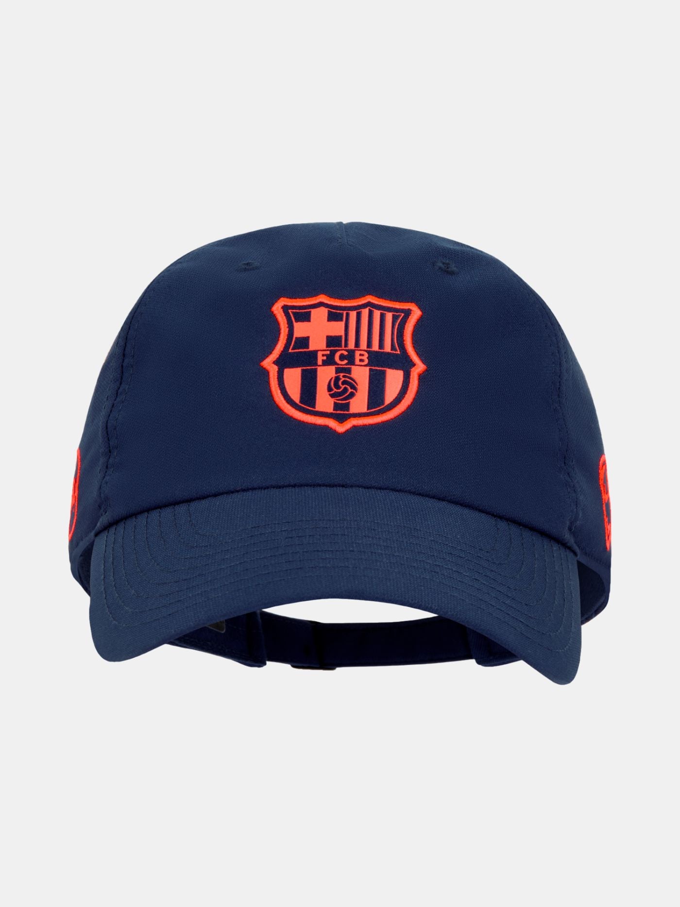 Navy blue FC Barcelona cap featuring the club crest in bright orange on the front