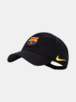 Black FC Barcelona cap with the club crest on the front and yellow Nike logo on the side