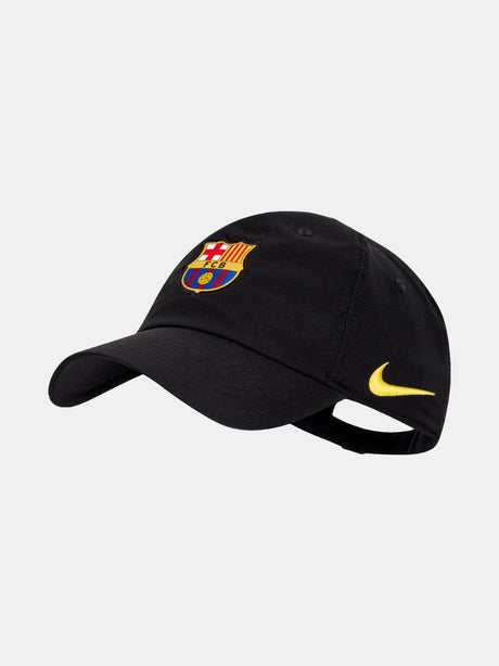 Black FC Barcelona cap with the club crest on the front and yellow Nike logo on the side
