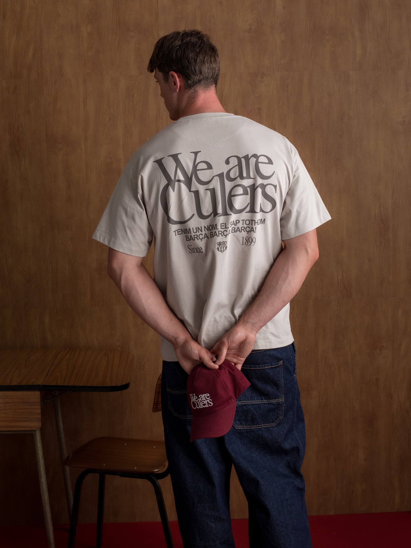 Light grey T-shirt with bold 'We are Culers' text and additional typography on the back.