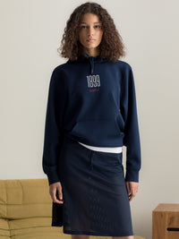 Dessuadora amb caputxa atemporal blau marí Barça - Dona