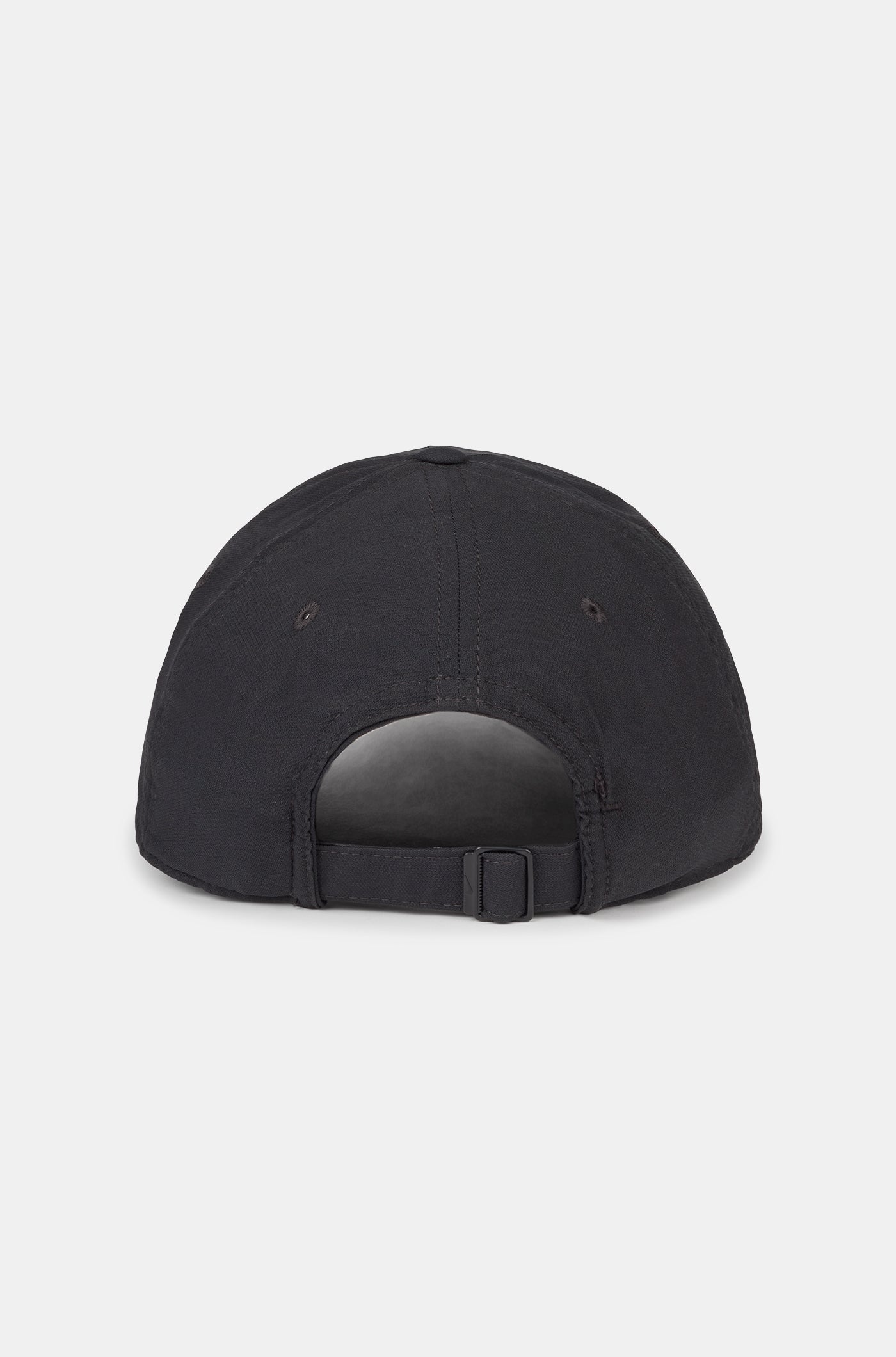 Black curved-brim cap featuring the FC Barcelona crest on the front and a white Nike swoosh embroidered on the side.