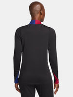 FC Barcelona black long-sleeve training top with white crest, Spotify logo, and red-blue shoulder accents.