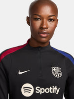 FC Barcelona black long-sleeve training top with white crest, Spotify logo, and red-blue shoulder accents.