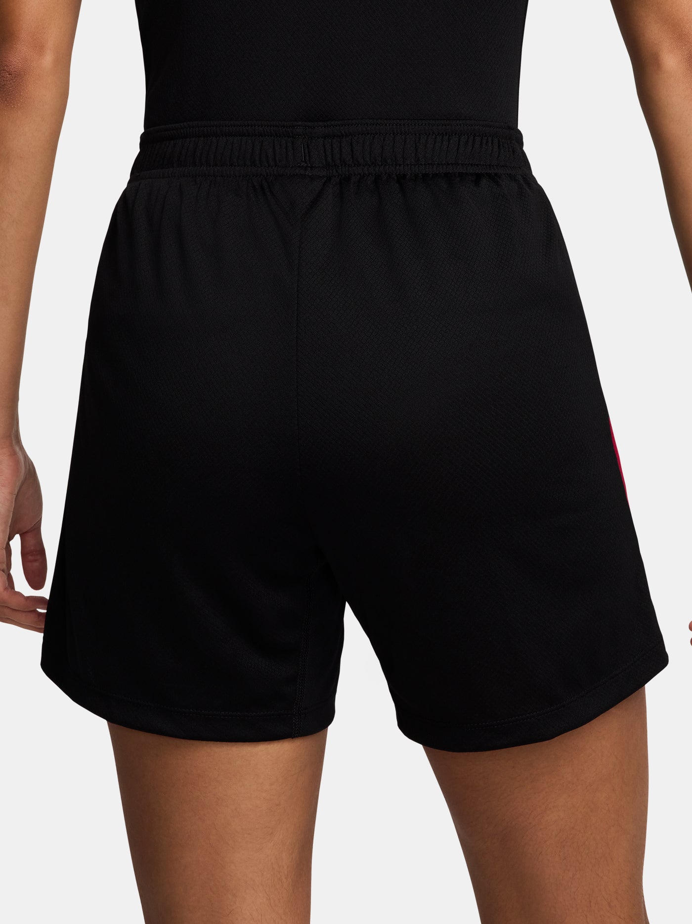 FC Barcelona black shorts with white crest, Nike logo, and red-blue side accents.