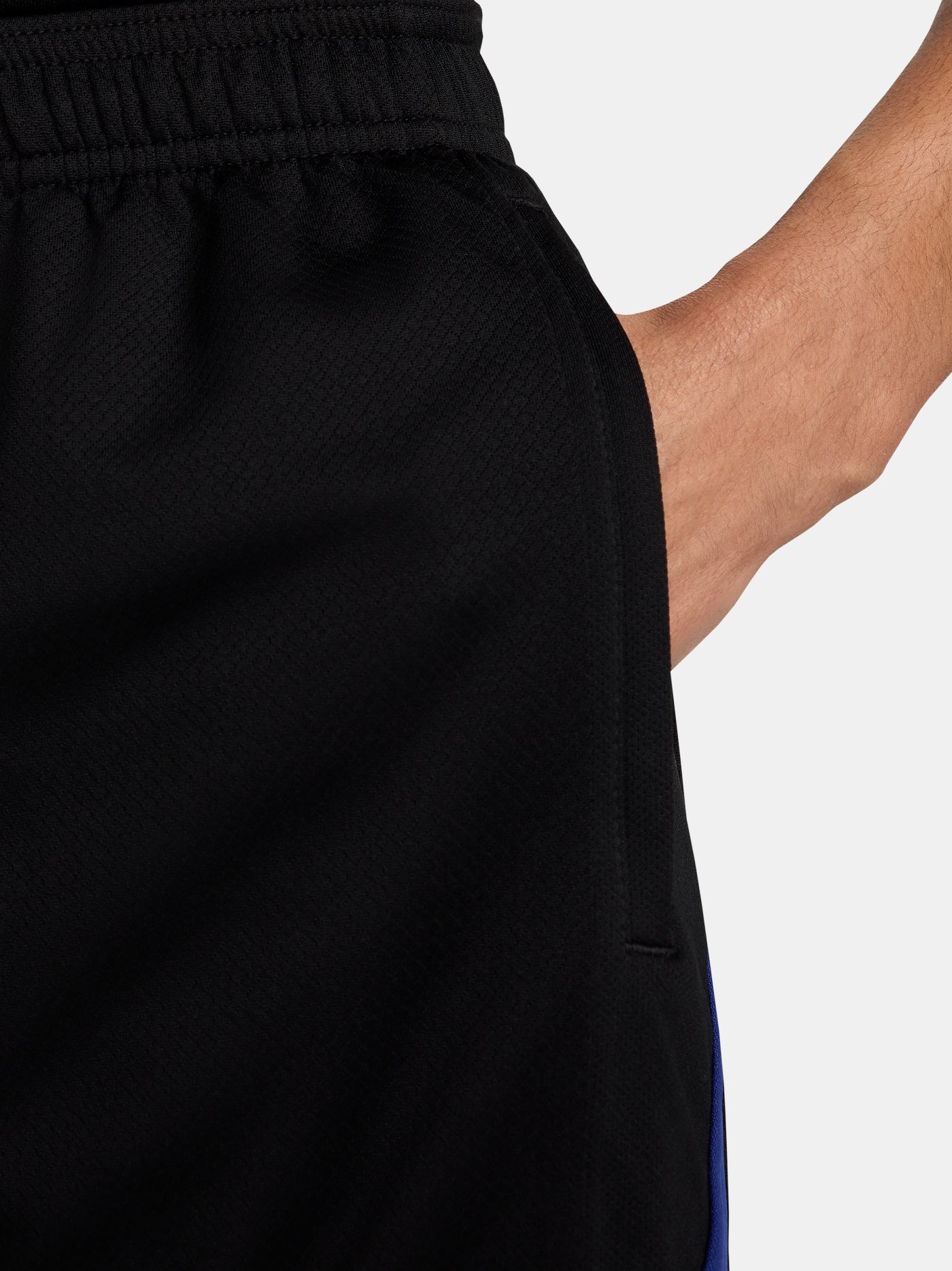 FC Barcelona black shorts with white crest, Nike logo, and red-blue side accents.