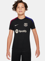 FC Barcelona black kids' training shirt with white Spotify logo and crest, red and blue shoulder details.