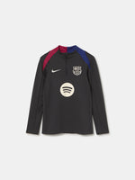 FC Barcelona black long-sleeve youth training top with white crest and central Spotify logo, red and blue shoulder panels.