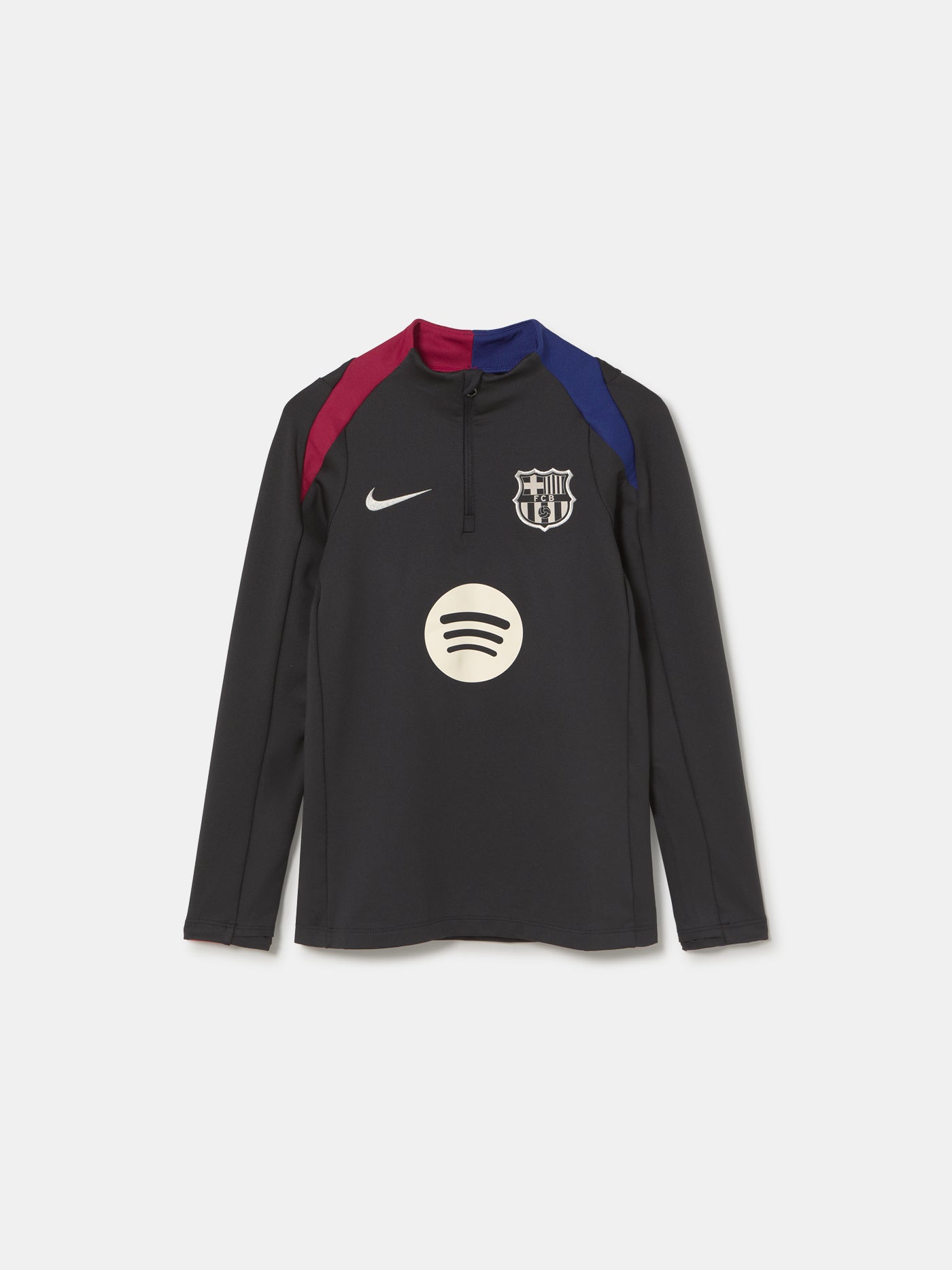 FC Barcelona black long-sleeve youth training top with white crest and central Spotify logo, red and blue shoulder panels.