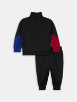 Black FC Barcelona tracksuit with red and blue sleeve cuffs, Nike logo and club crest.