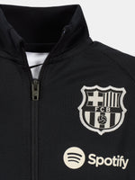 Black FC Barcelona tracksuit with red and blue sleeve cuffs, Nike logo and club crest.
