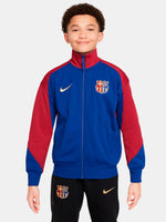 FC Barcelona retro-style jacket in blue and red with gold Nike logo and crest.
